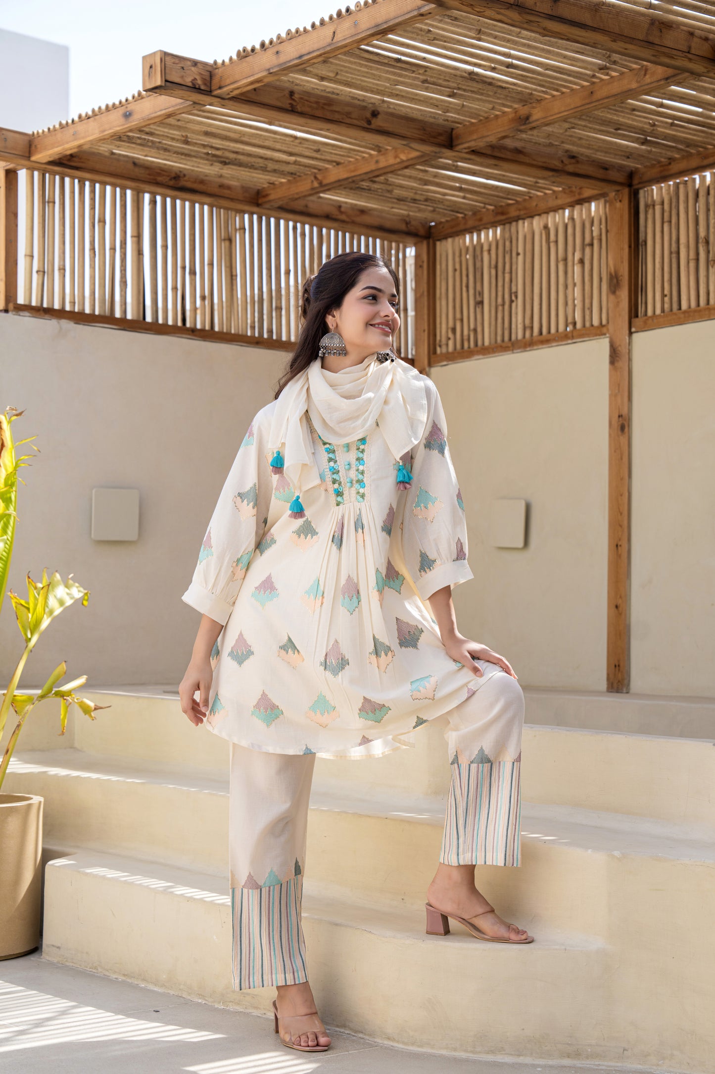 Pastel Geometric Printed A-Line Kurta Set With Embroidered Detailing and Dupatta