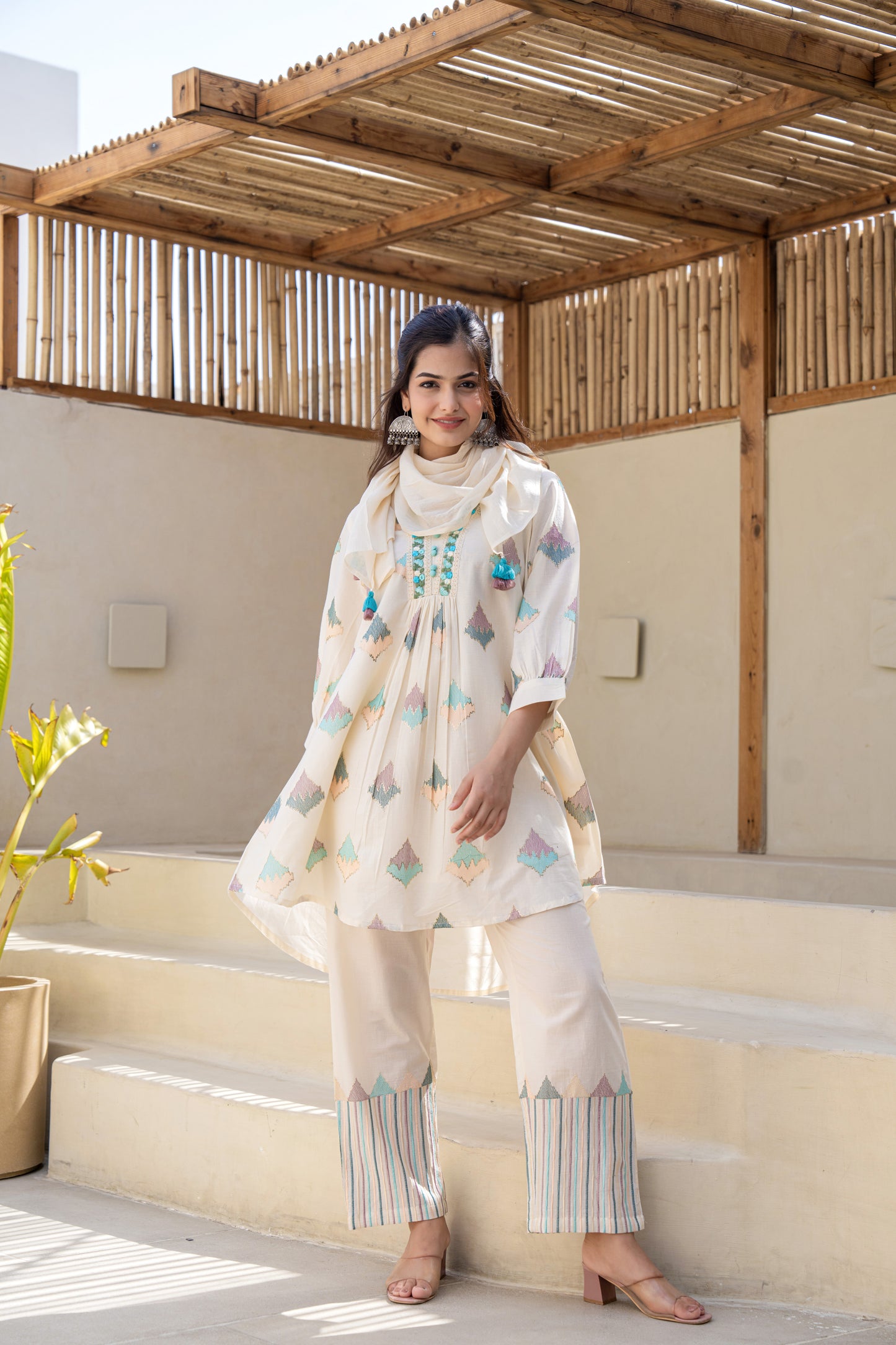 Pastel Geometric Printed A-Line Kurta Set With Embroidered Detailing and Dupatta