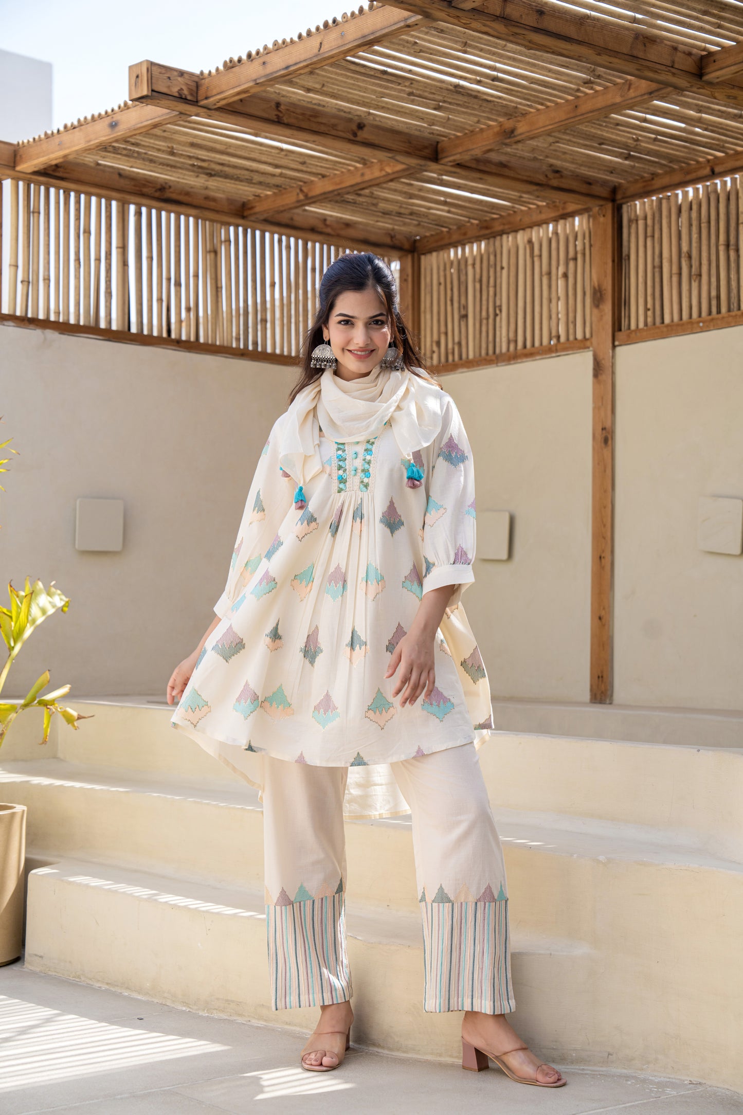 Pastel Geometric Printed A-Line Kurta Set With Embroidered Detailing and Dupatta