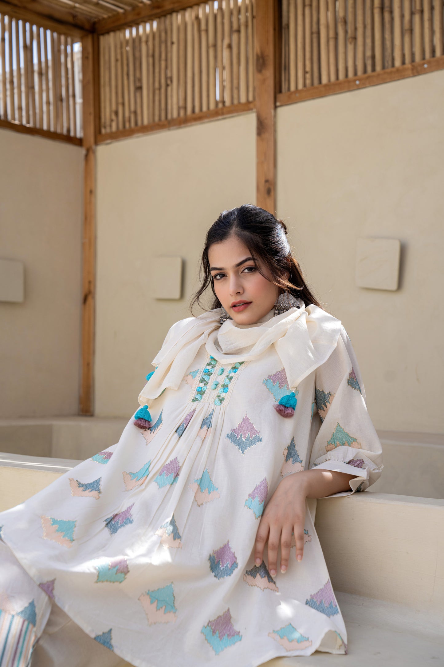Pastel Geometric Printed A-Line Kurta Set With Embroidered Detailing and Dupatta