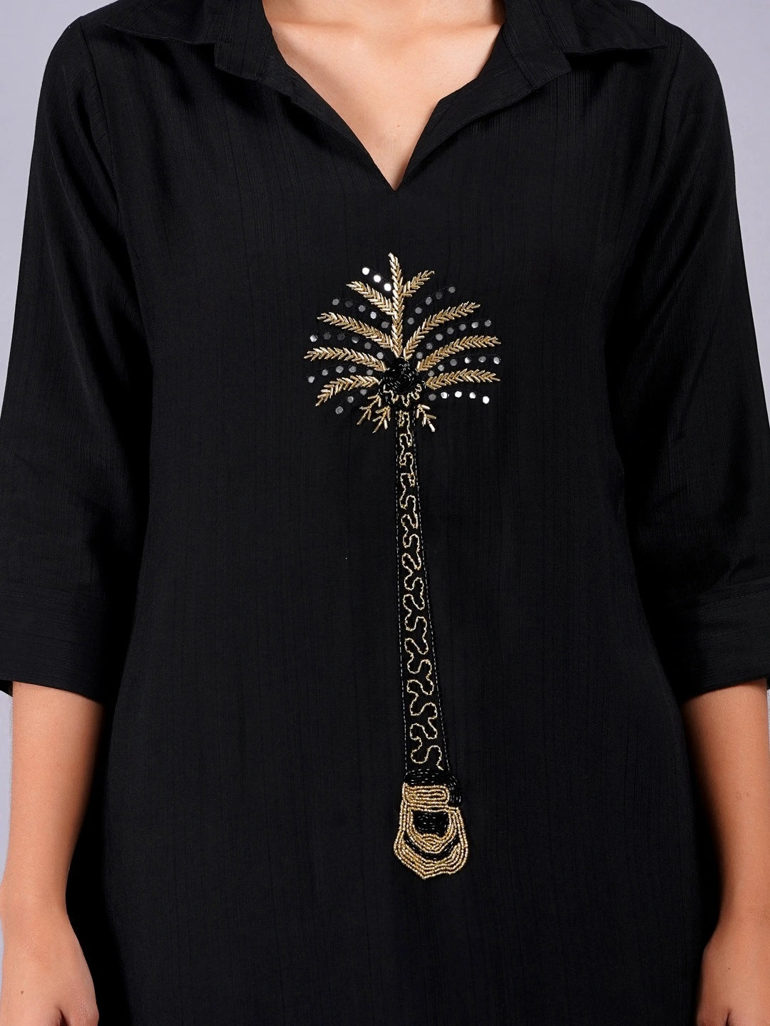 Intricate handwork black women’s outfit