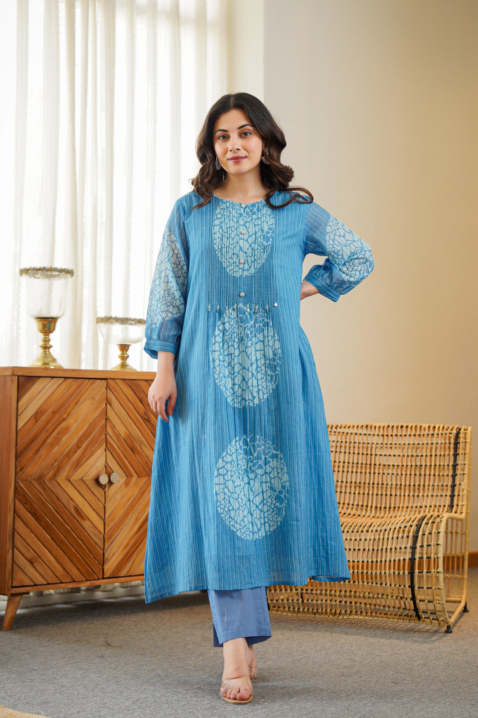 Model wearing blue printed A-line kurta pant set
