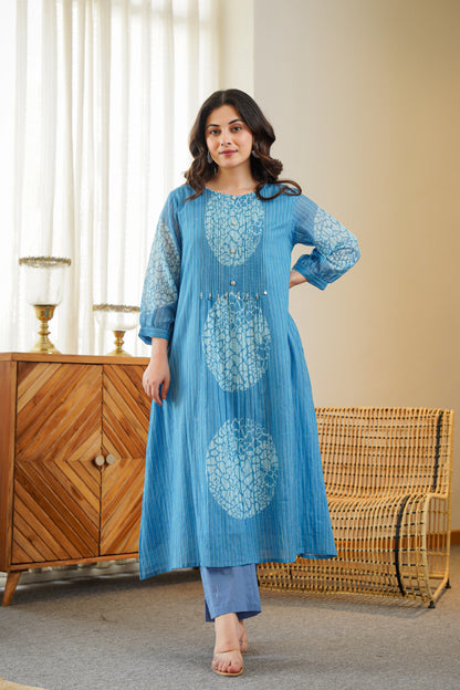 Model wearing blue printed A-line kurta pant set