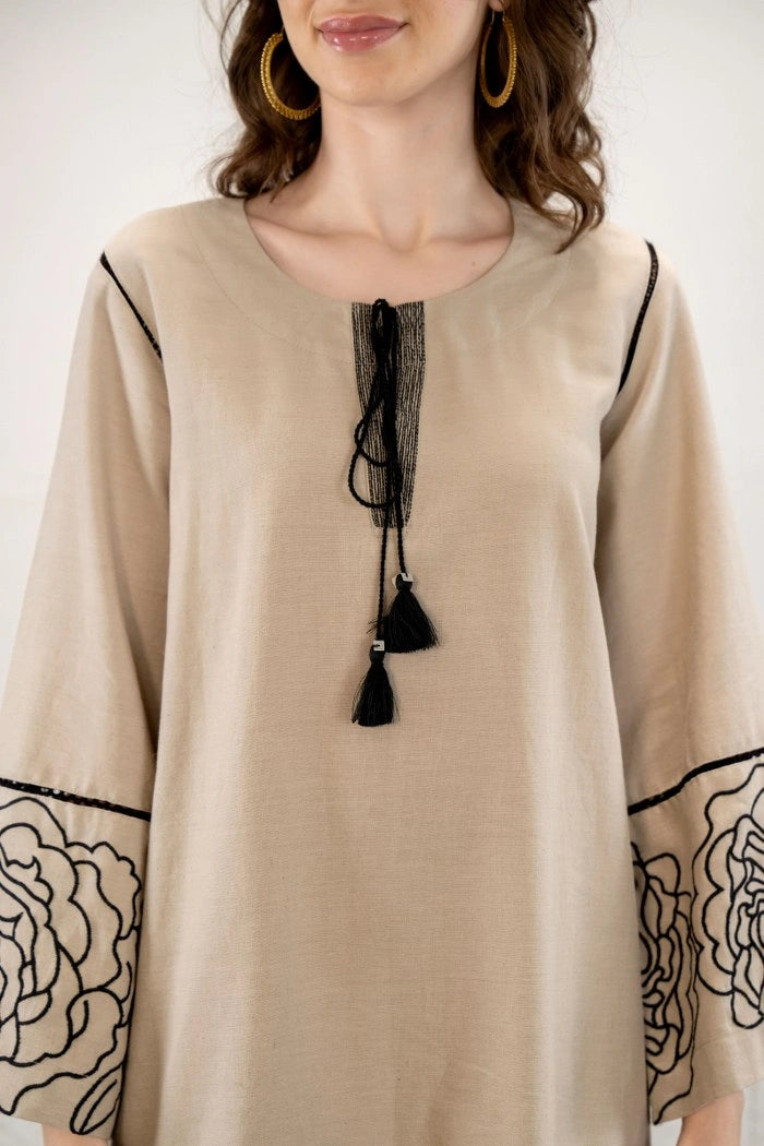 Shreenaya | Woman wearing beige floral embroidered co-ord set