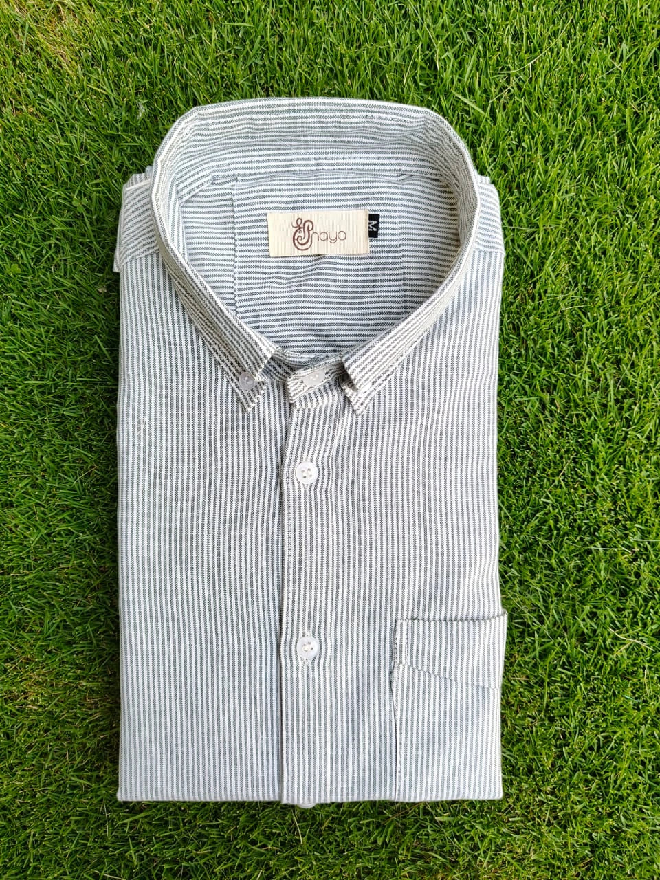 green striped oxford men’s shirt styled for casual wear