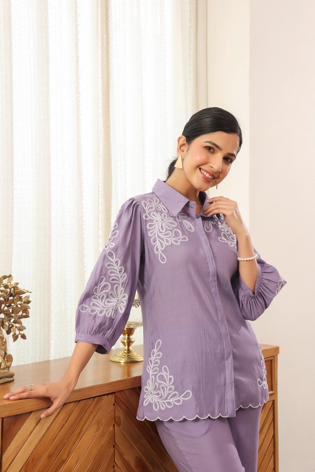 Woman wearing lavender muslin embroidered co-ord set