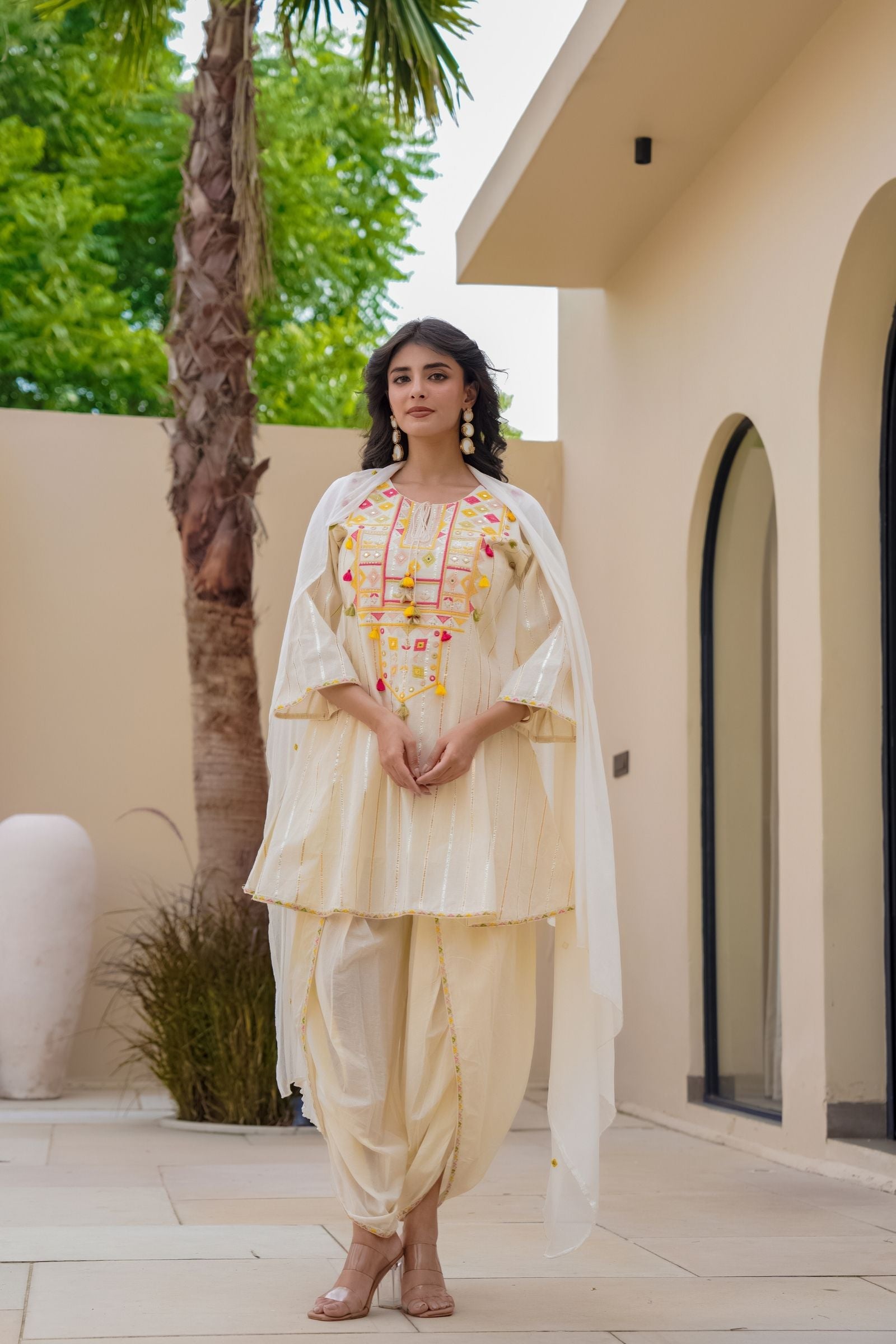 Designer off white embroidered peplum top with dhoti