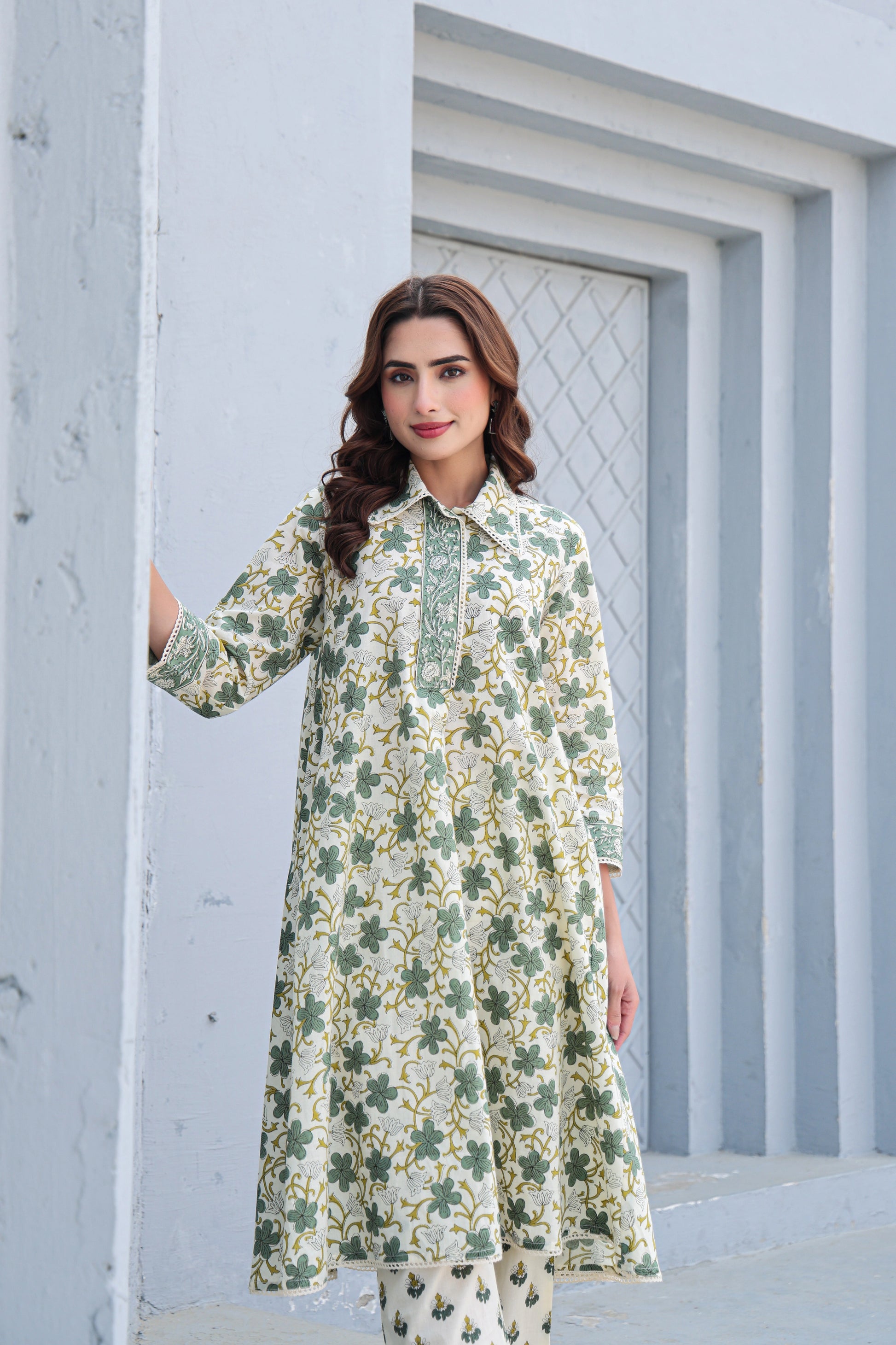 Close up of floral print on white and green cotton co-ord set