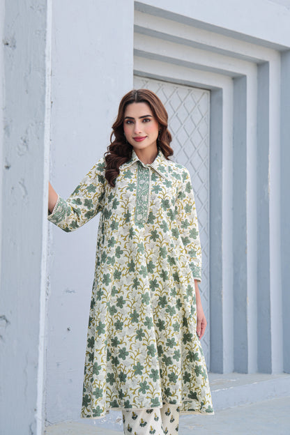 Close up of floral print on white and green cotton co-ord set