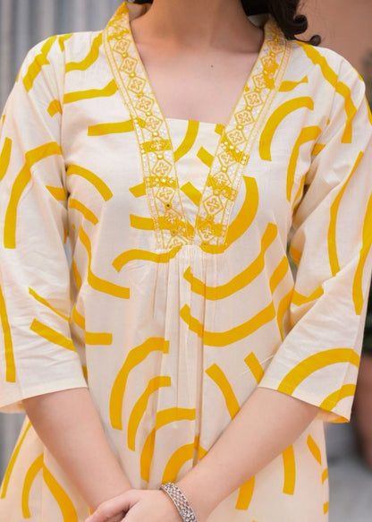 yellow kurta ethnic print fabric detail close up